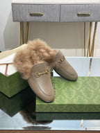 HORSEBIT MULE IN PEANUT BROWN CALFSKIN AND LAMB WOOL LINING