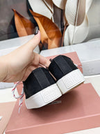 WASHED-DENIM SNEAKERS IN BLACK CANVAS WITH BROWN AND STRIPED LACES