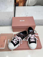 WASHED-DENIM SNEAKERS IN BLACK CANVAS WITH BROWN AND STRIPED LACES