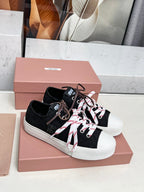 WASHED-DENIM SNEAKERS IN BLACK CANVAS WITH BROWN AND STRIPED LACES