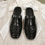 FLAT MULES IN BLACK CROCODILE EMBOSSED GLOSSY CALFSKIN