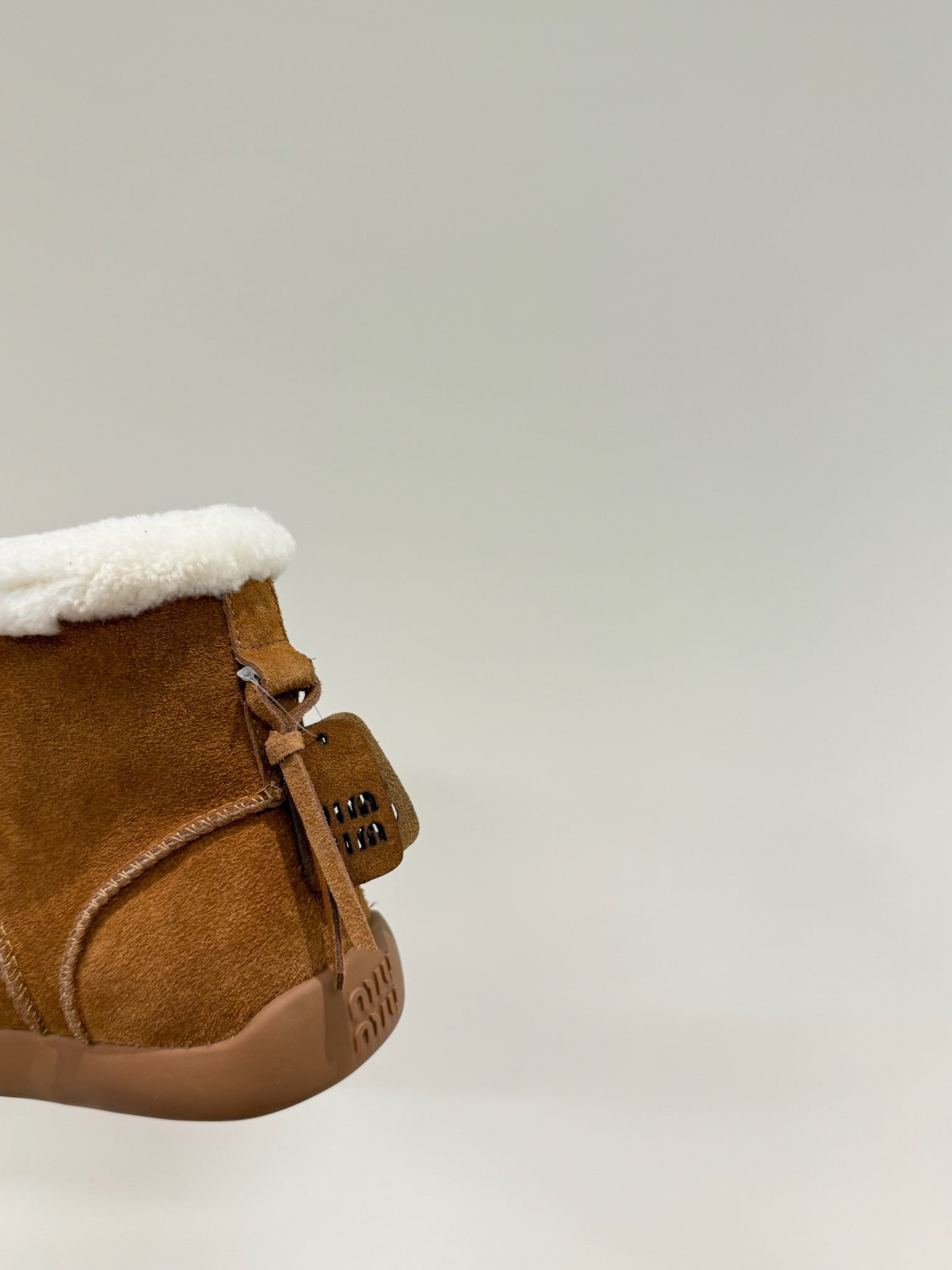 ANKLE BOOTS IN BRONZE BROWN SUEDE AND FLEECE LINING