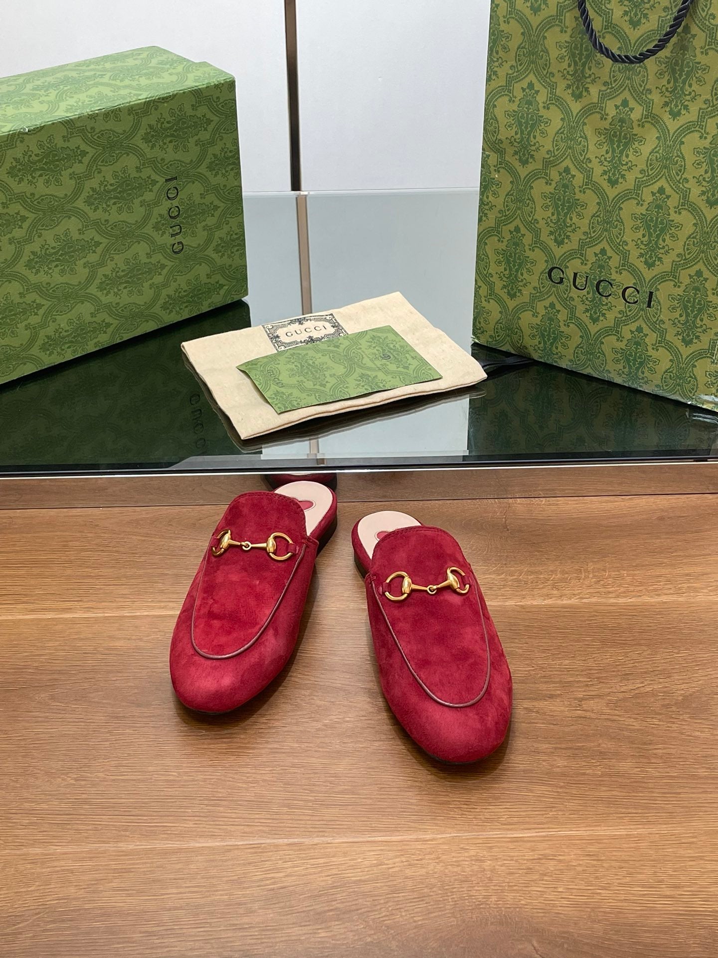 HORSEBIT MULE IN CHERRY RED SUEDE WITH GOLD HARDWARE