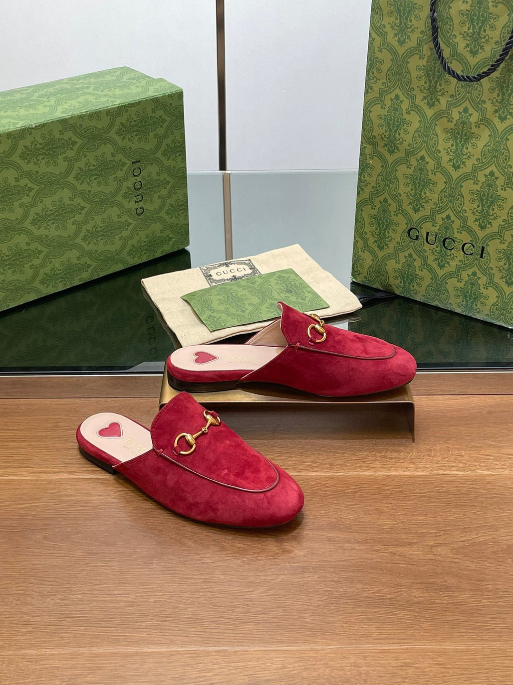 HORSEBIT MULE IN CHERRY RED SUEDE WITH GOLD HARDWARE