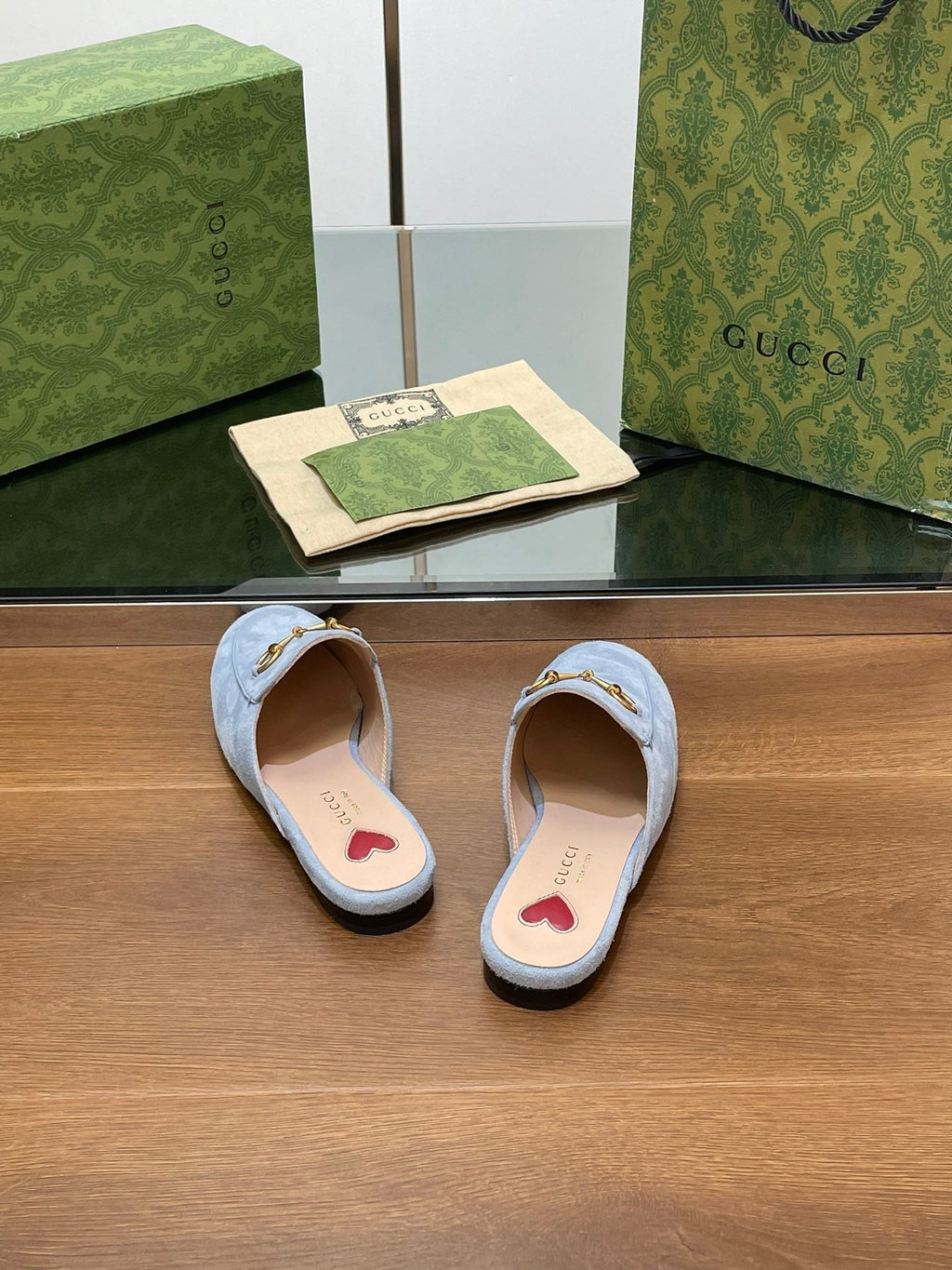 HORSEBIT MULE IN LIGHT BLUE SUEDE WITH GOLD HARDWARE