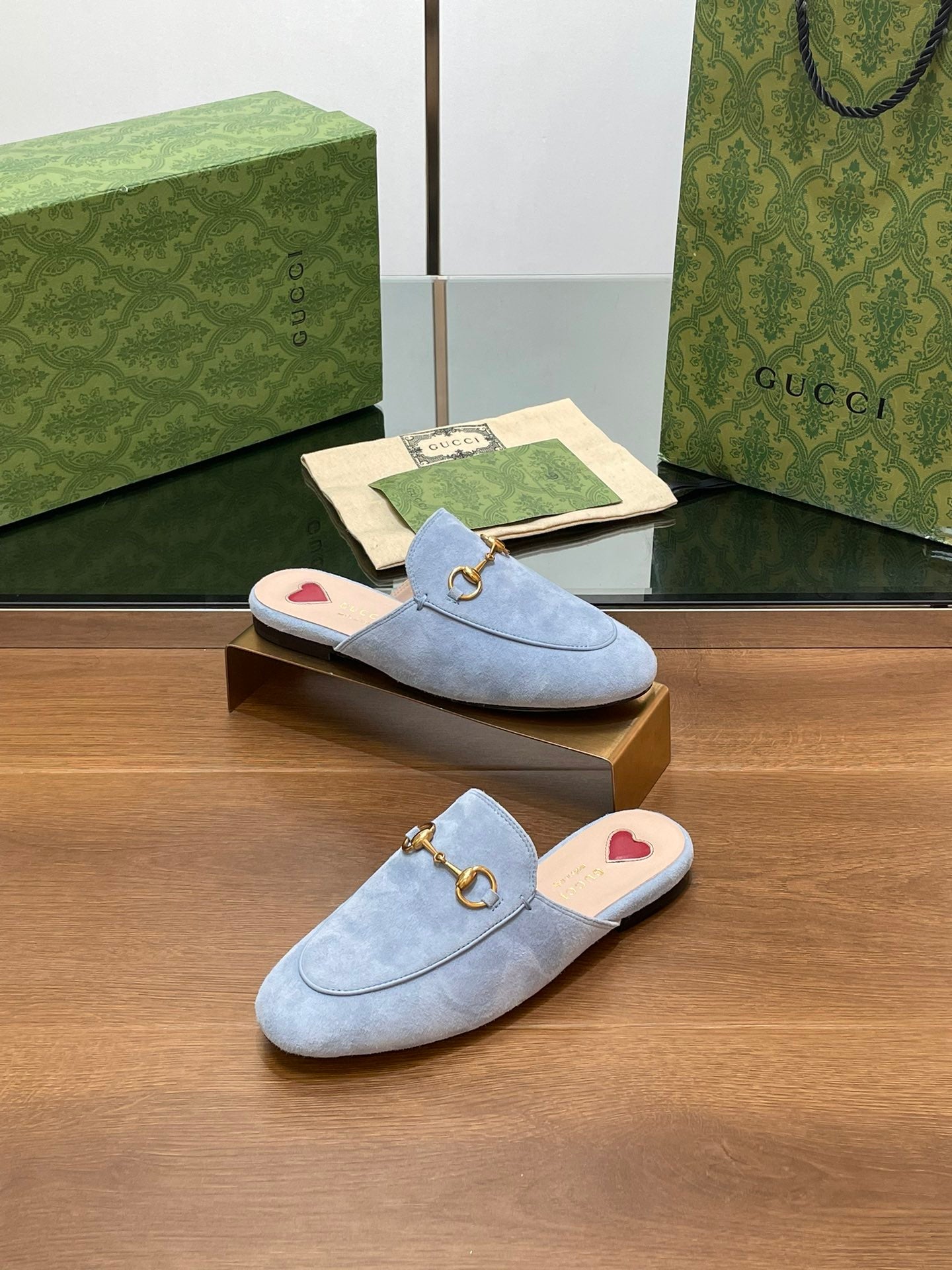 HORSEBIT MULE IN LIGHT BLUE SUEDE WITH GOLD HARDWARE
