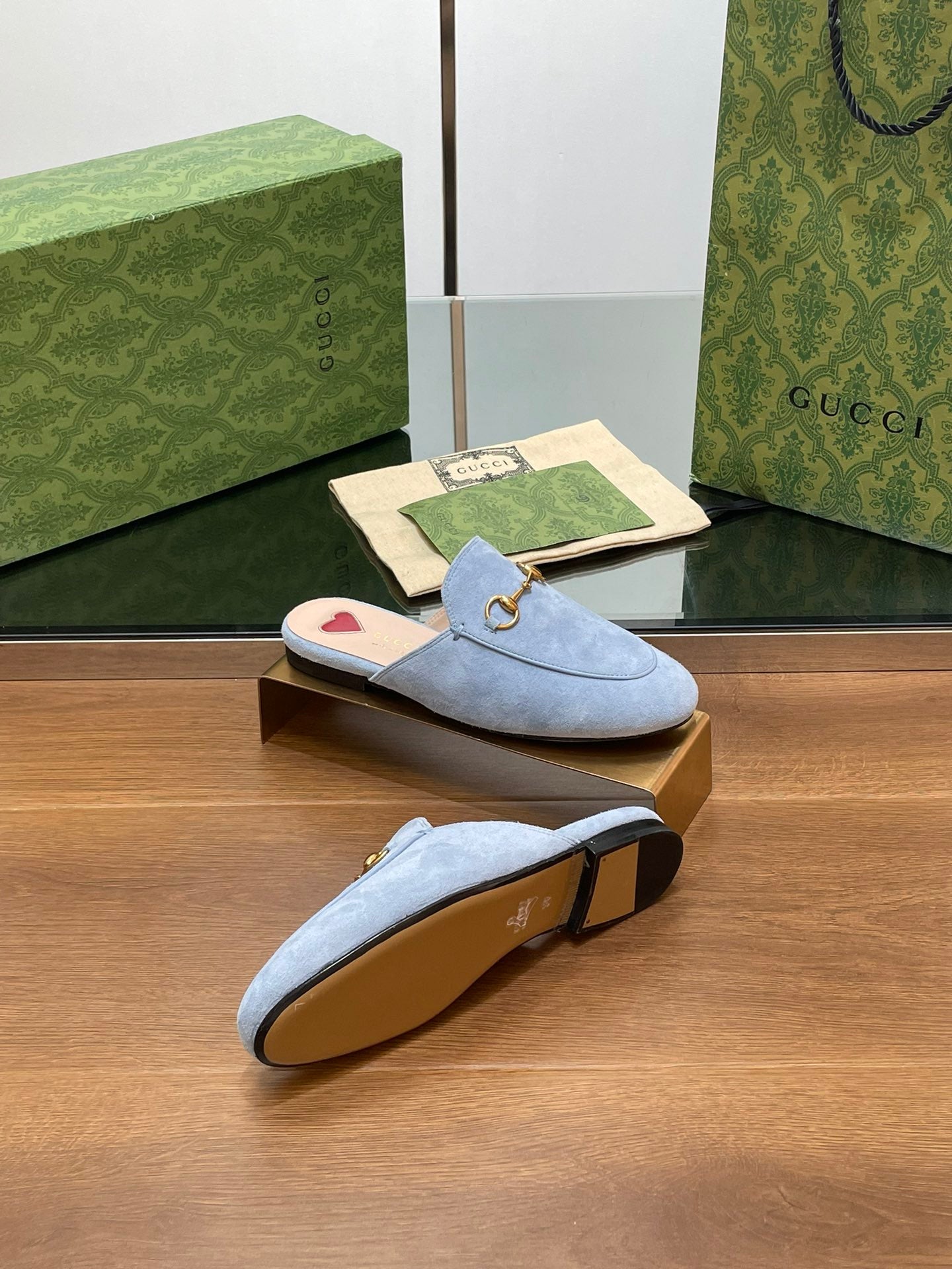 HORSEBIT MULE IN LIGHT BLUE SUEDE WITH GOLD HARDWARE