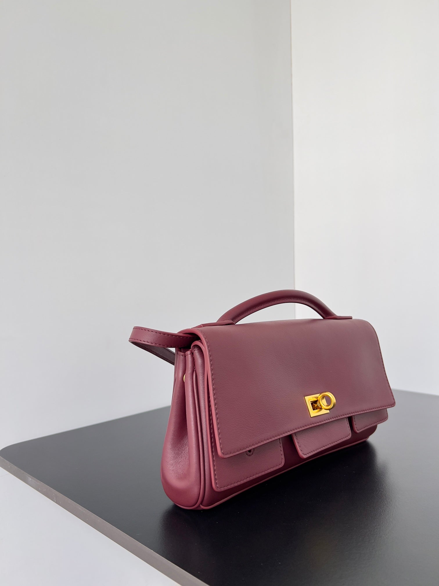 BEL AIR CLUTCH 27 IN BURGUNDY RED NAPPA LAMBSKIN GOLD HARDWARE