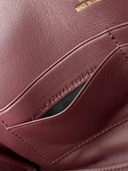 BEL AIR CLUTCH 27 IN BURGUNDY RED NAPPA LAMBSKIN GOLD HARDWARE