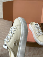 WASH SNEAKER MULES IN OFF WHITE DENIM WHITE STRIPED LACES