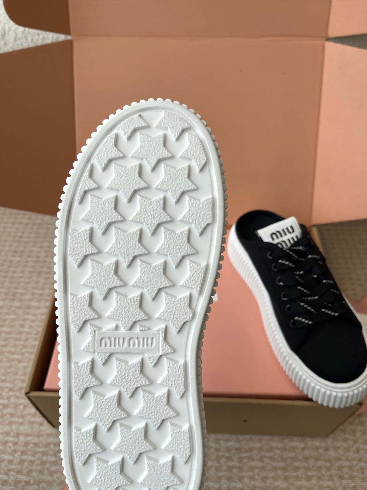 WASH SNEAKER MULES IN BLACK DENIM