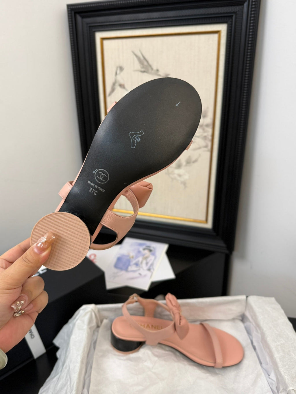 FLAT SANDALS IN PEACHY PINK CALFSKIN WITH BOW