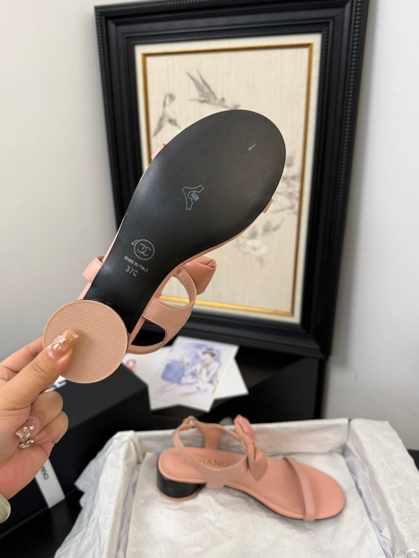 FLAT SANDALS IN PEACHY PINK CALFSKIN WITH BOW