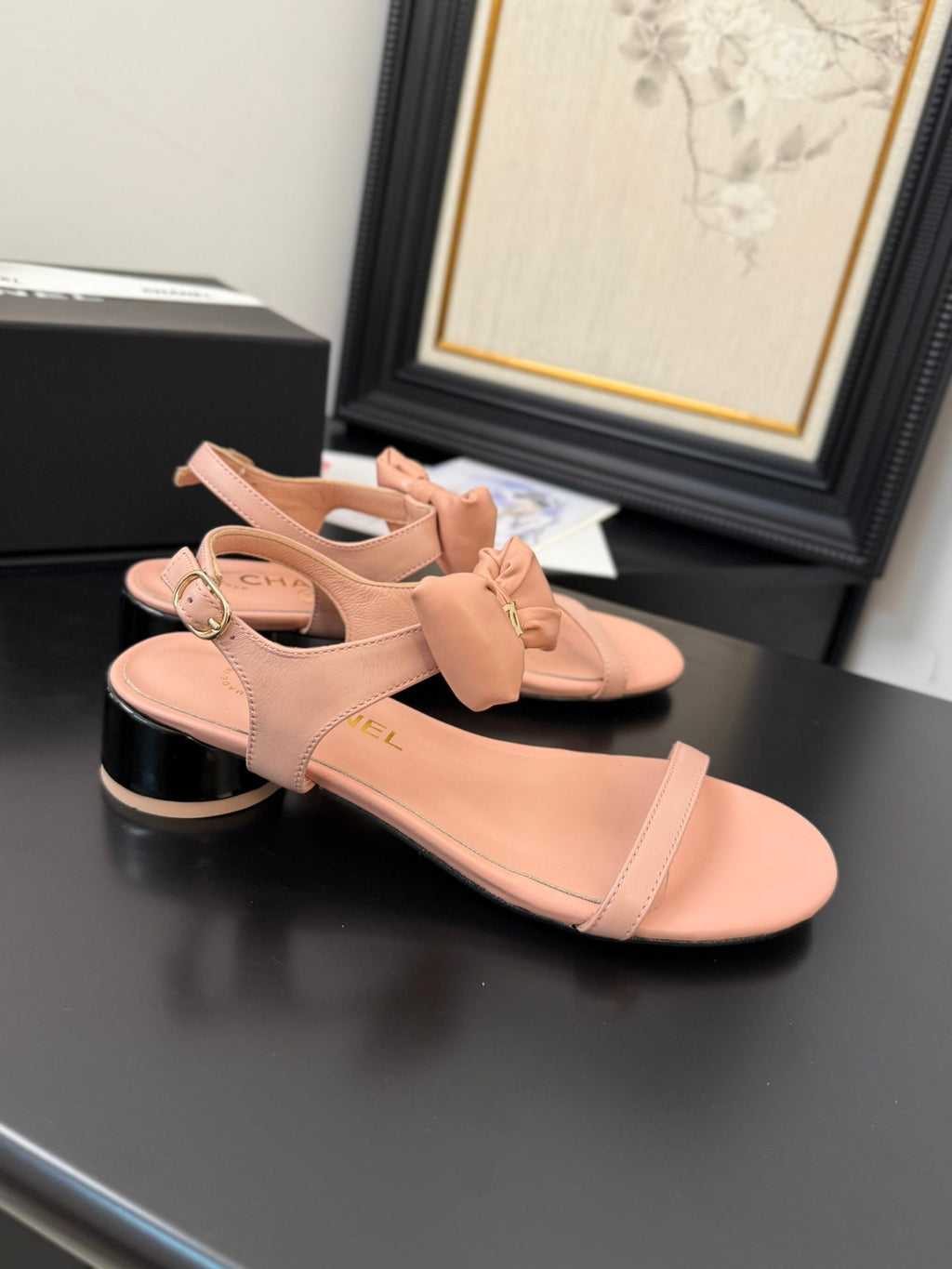 FLAT SANDALS IN PEACHY PINK CALFSKIN WITH BOW