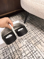 FLAT MULES IN WHITE CALFSKIN